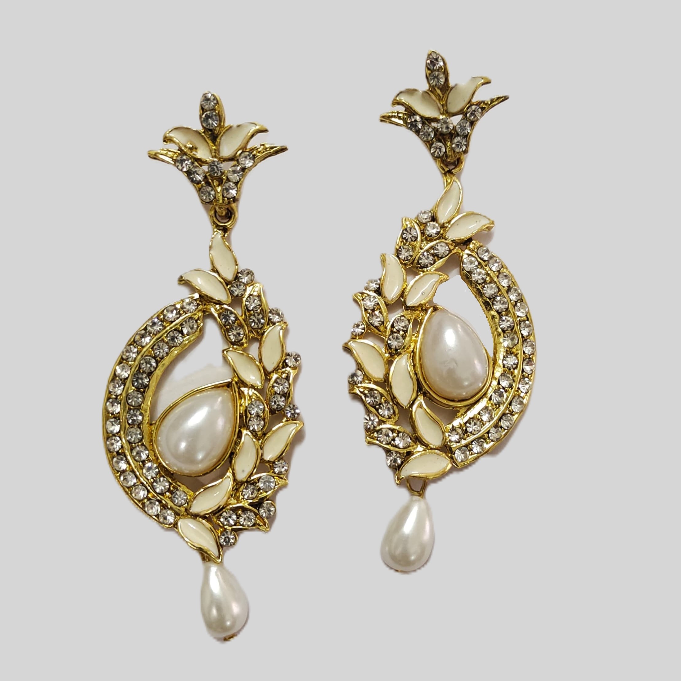 Close-up of the captivating pink gemstone in the Rajasthani white Gemstone Drop Earrings