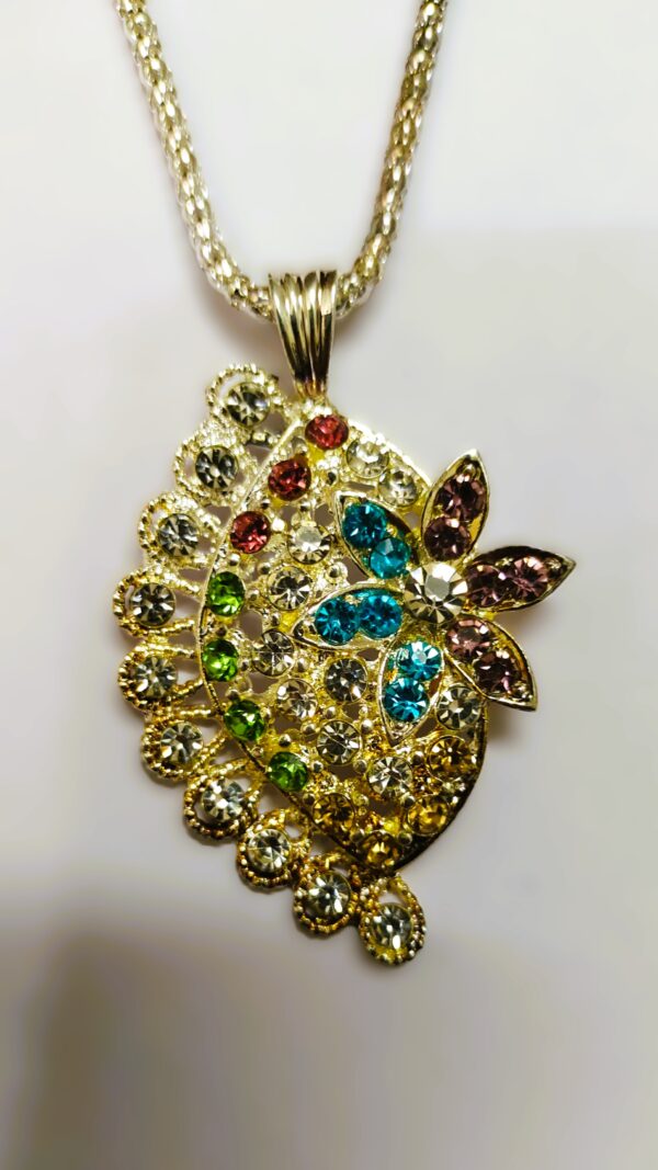 Close-up of the peacock-inspired pendant on the Rajasthani Peacock-Inspired Pendant Necklace