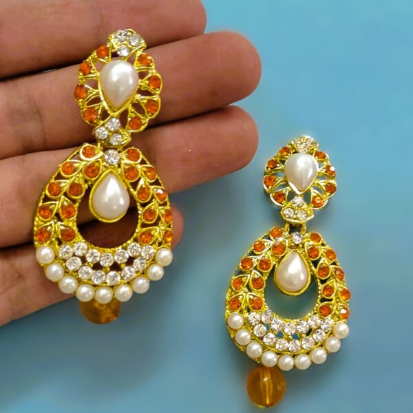 Intricate gold-toned metalwork on the Rajasthani Gold-Plated Drop Earrings