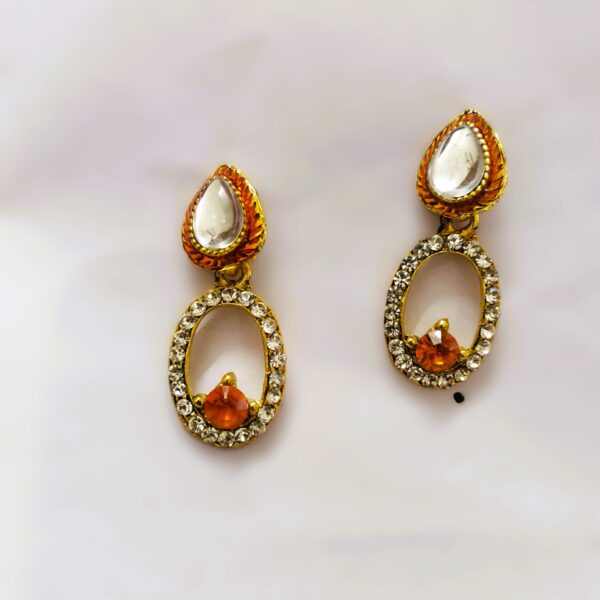 Intricate gold-toned metalwork on the Rajasthani Jhumka Earrings Title: Rajasthani Jhumka Earrings - Metalwork Detail