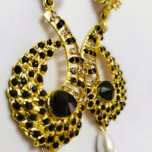 Close-up of the black and white stones on the Rajasthani Peacock-Inspired Drop Earrings