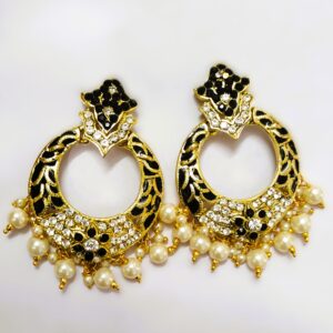 Intricate gold-toned metalwork on the Rajasthani Gold-Plated Drop Earrings