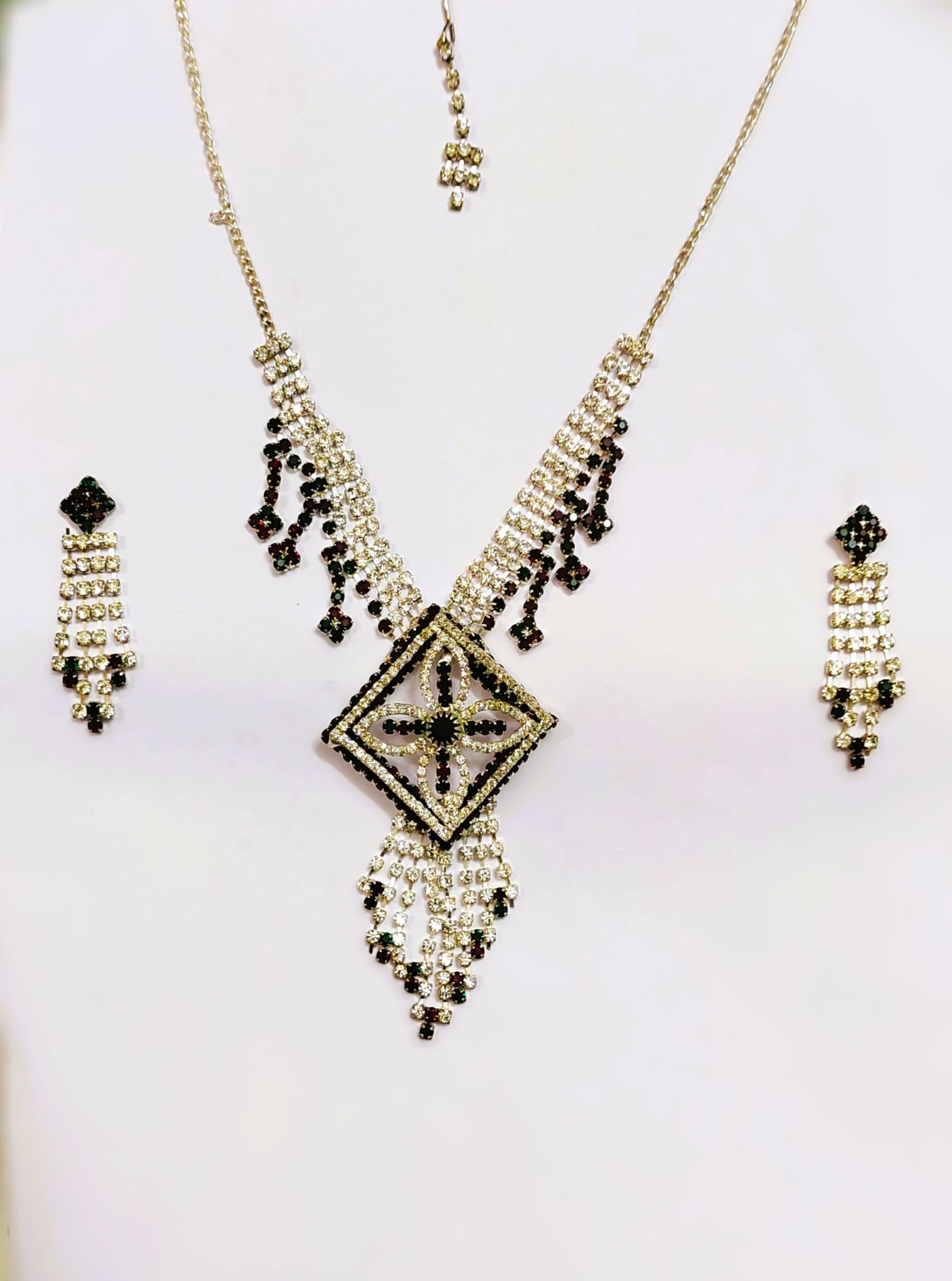 Rajasthani Gold-Plated Necklace Set with black and white stones and gold-toned metalwork