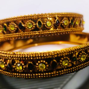 Close-up of the intricate details on the Rajasthani Gold-Plated Pearl and Diamond Kada Bangle Pair