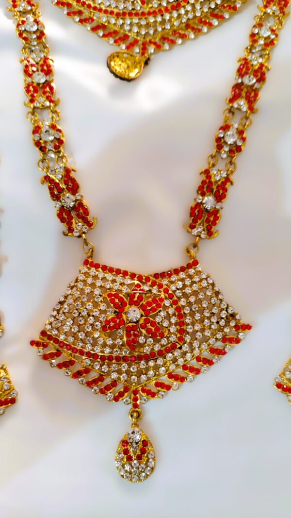 A close-up of the intricate details on the necklace, showcasing the Kundan and American diamond stones.