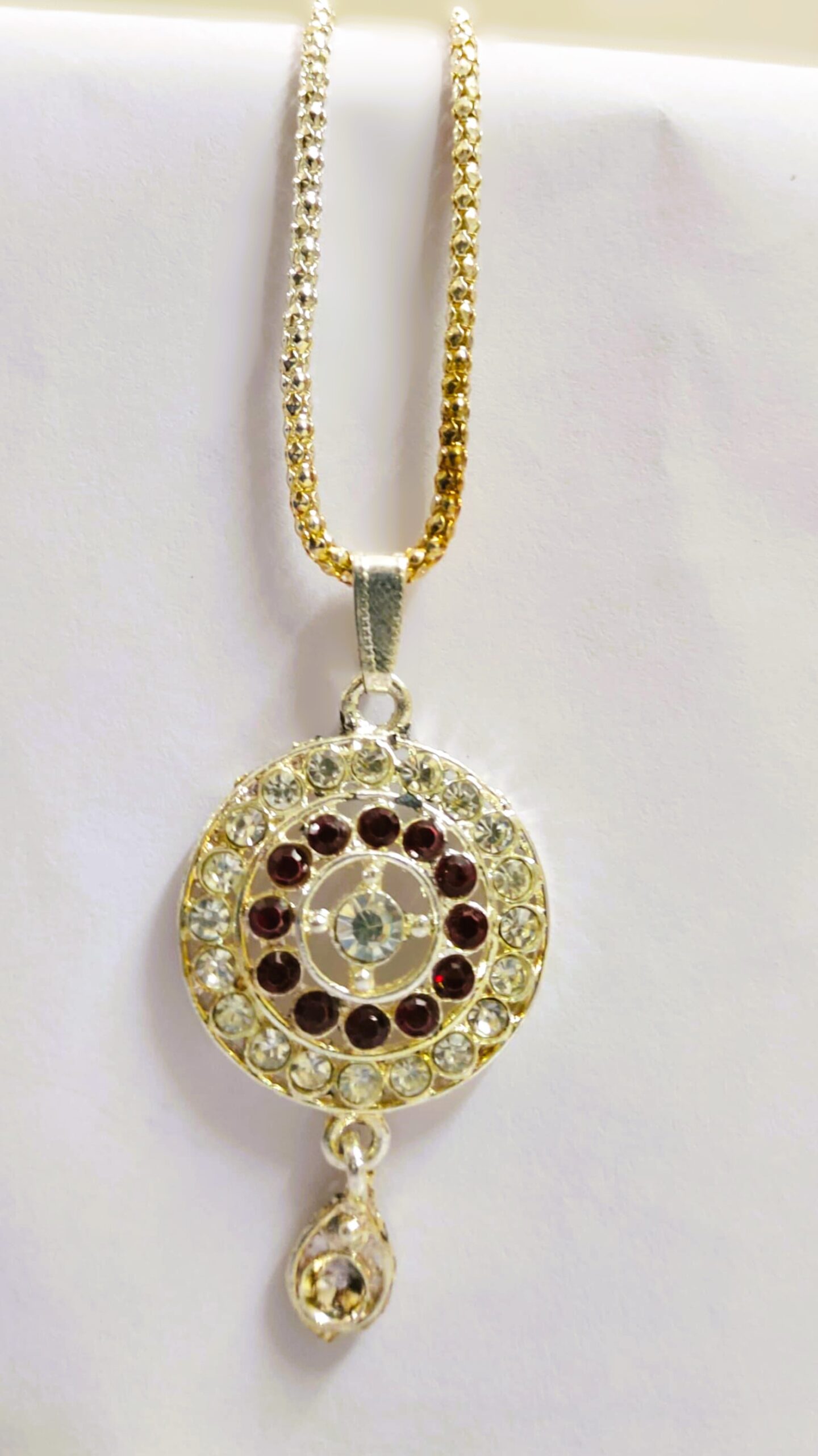 Close-up of the pendant on the Jaipur Gold-Plated Necklace Set