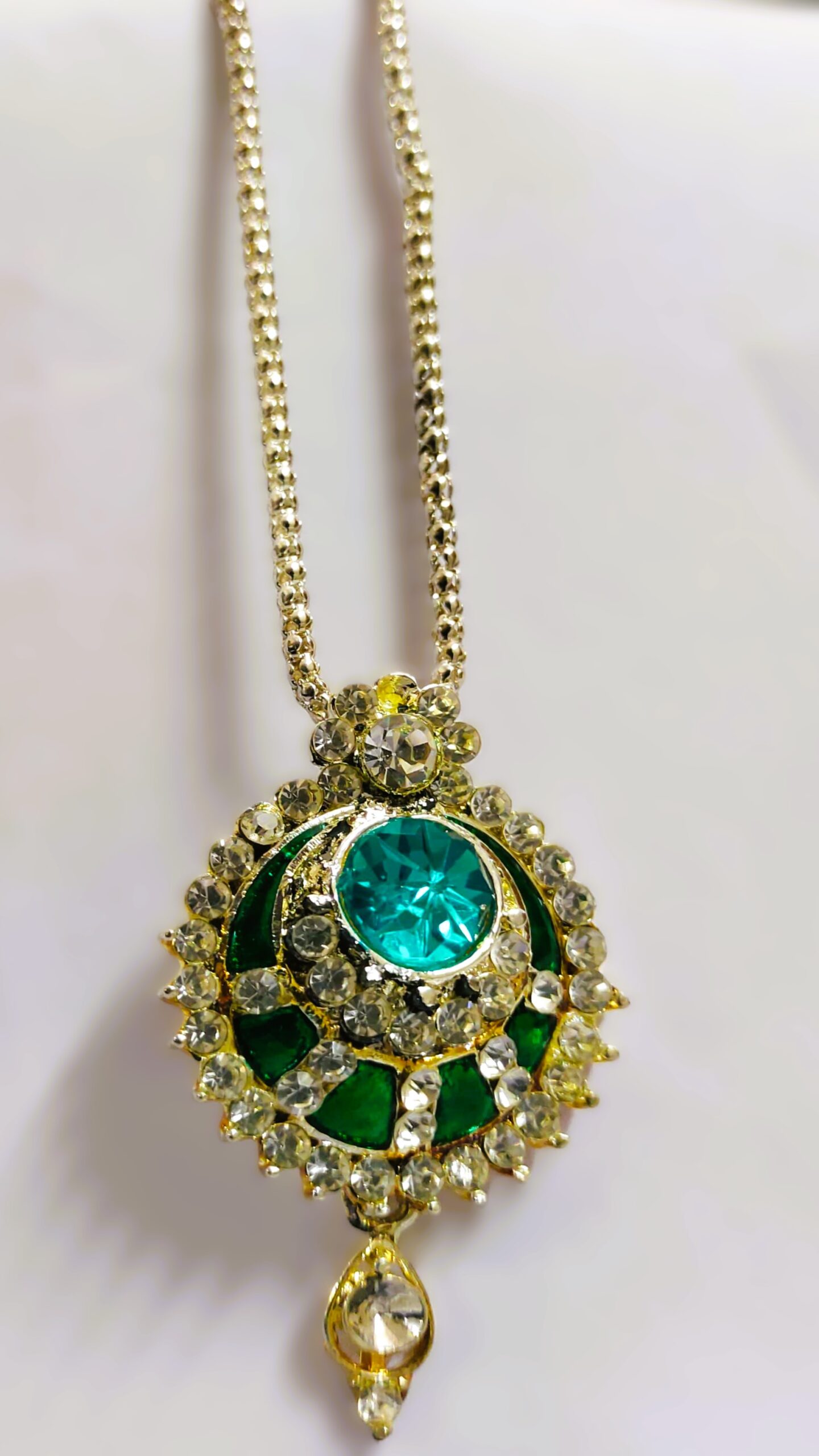 Close-up of the pendant on the Jaipur Gold-Plated Necklace Set