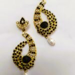 Rajasthani Peacock-Inspired Drop Earrings with black and white stones and gold-toned metalwork