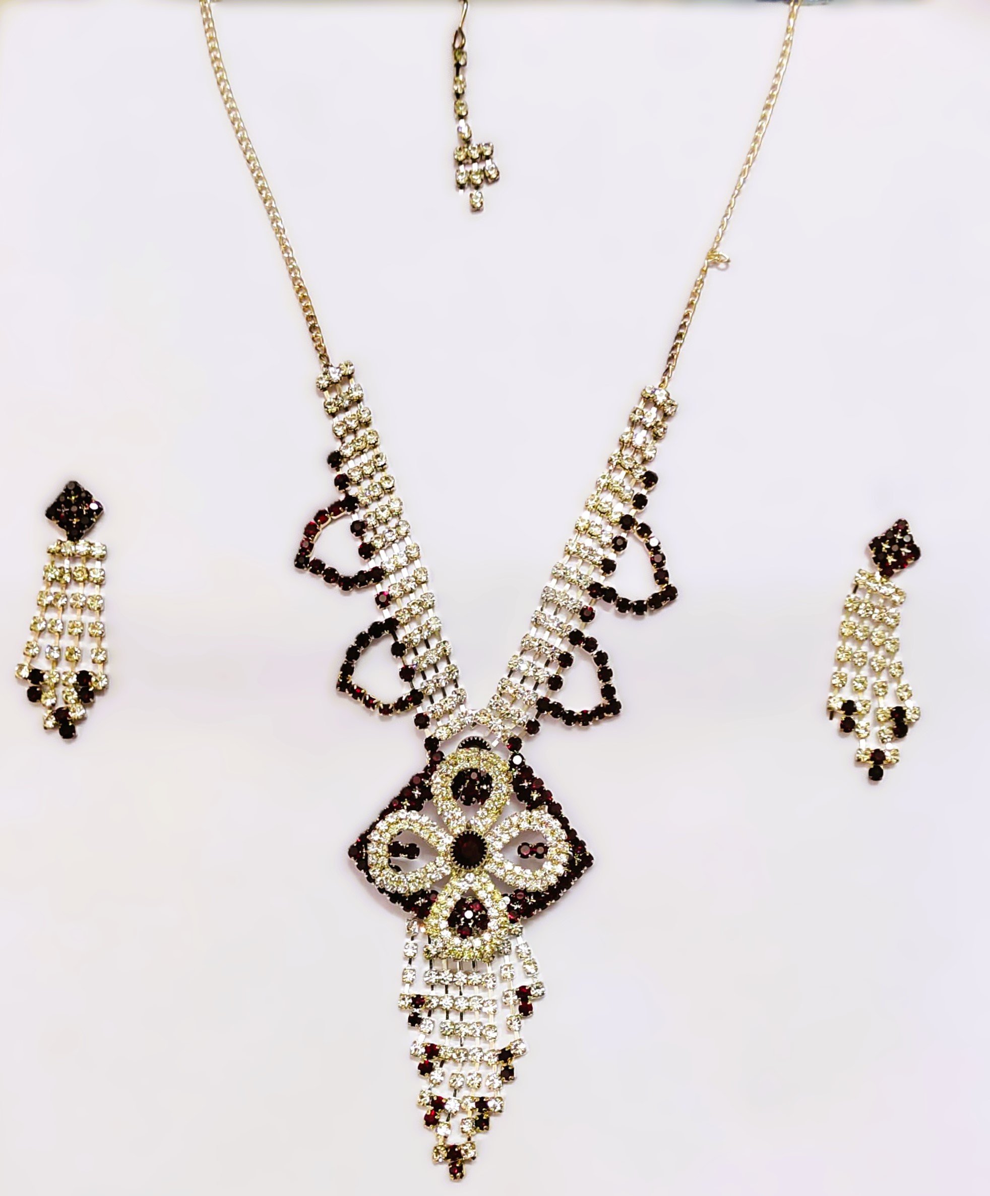 Rajasthani Gold-Plated Necklace Set with red and white stones and gold-toned metalwork