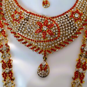 A close-up of the intricate details on the maang tika, showcasing the Kundan and American diamond stones.