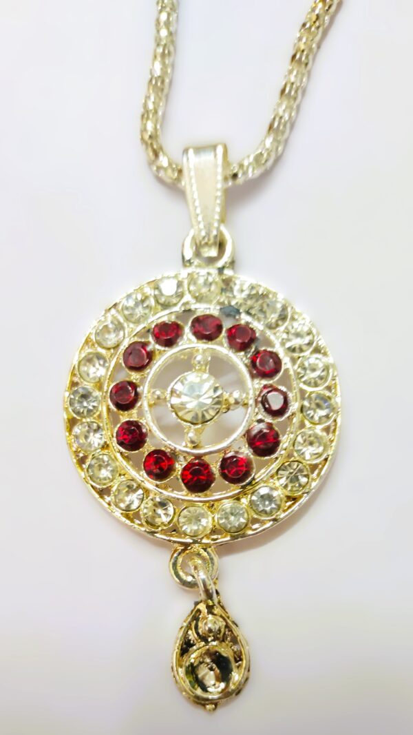 Close-up of the pendant on the Jaipur Gold-Plated Necklace Set