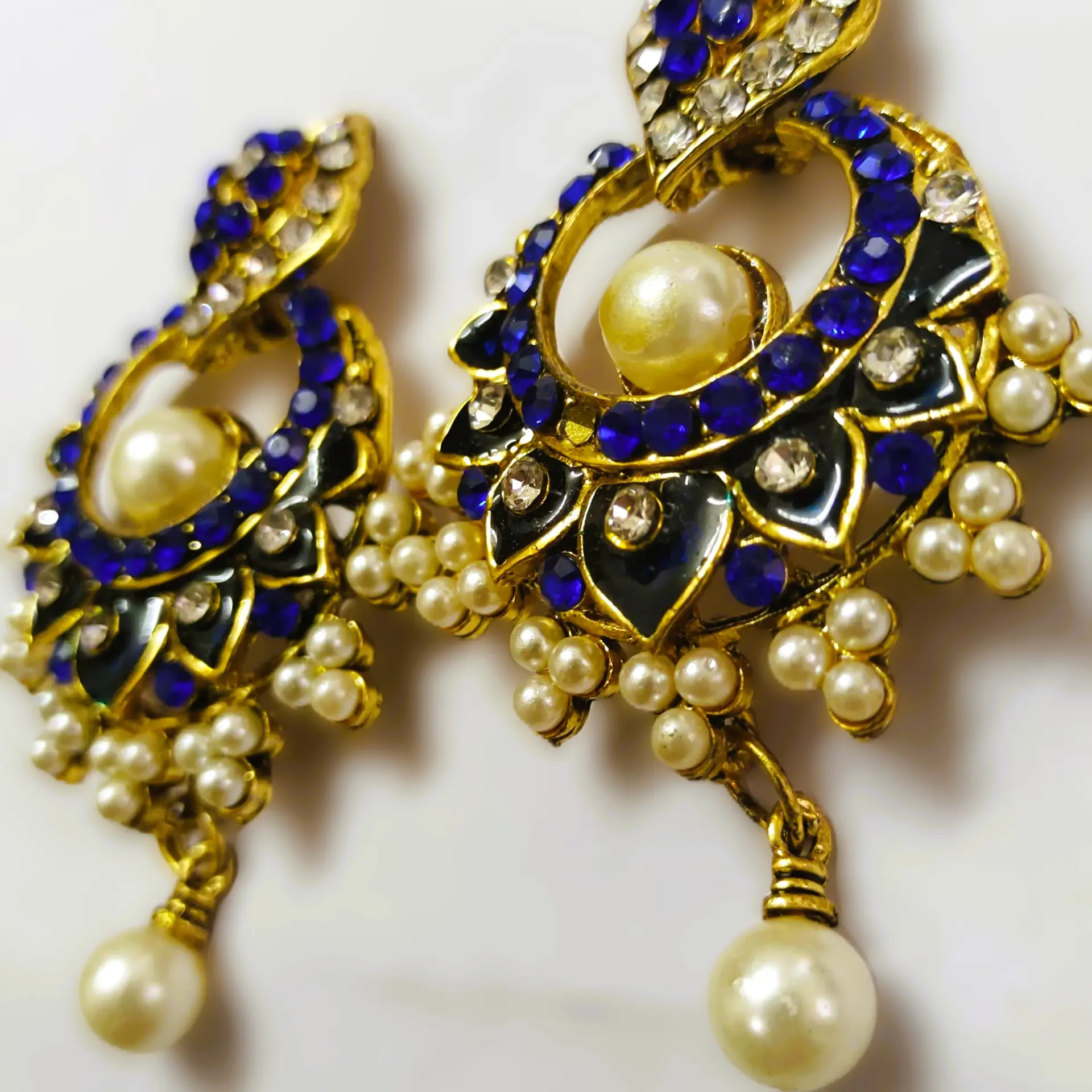 Close-up of the blue and white enamel on the Rajasthani Blue and White Enamel Drop Earrings