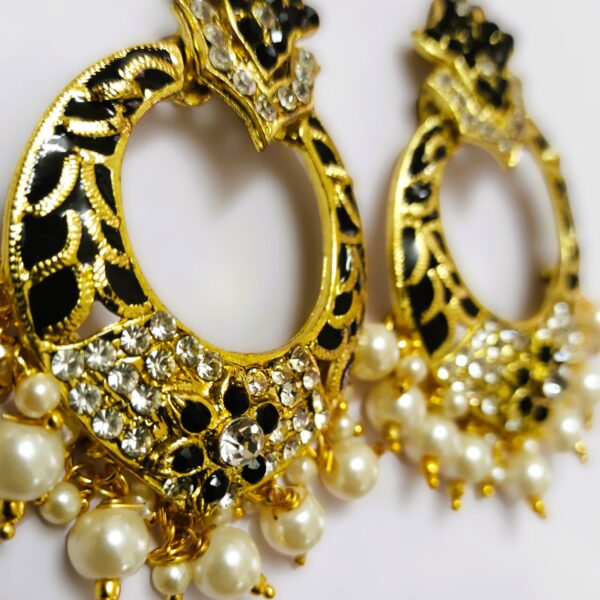 Close-up of the black enamel on the Rajasthani Gold-Plated Drop Earrings